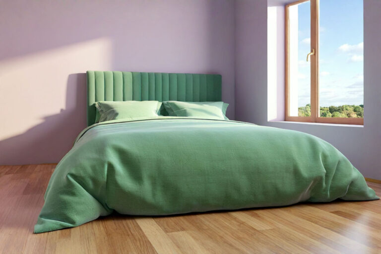 Professional, bright photograph showing a neatly made bed with layers of different textured sheets (perhaps percale and sateen visible), with a window in the background showing either a sunny or slightly overcast sky, subtly hinting at climate. The focus is on the quality and texture of the bedding.